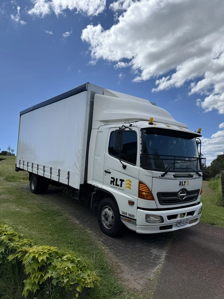 Photograph of an RLT Transport vehicle used for last-mile delivery